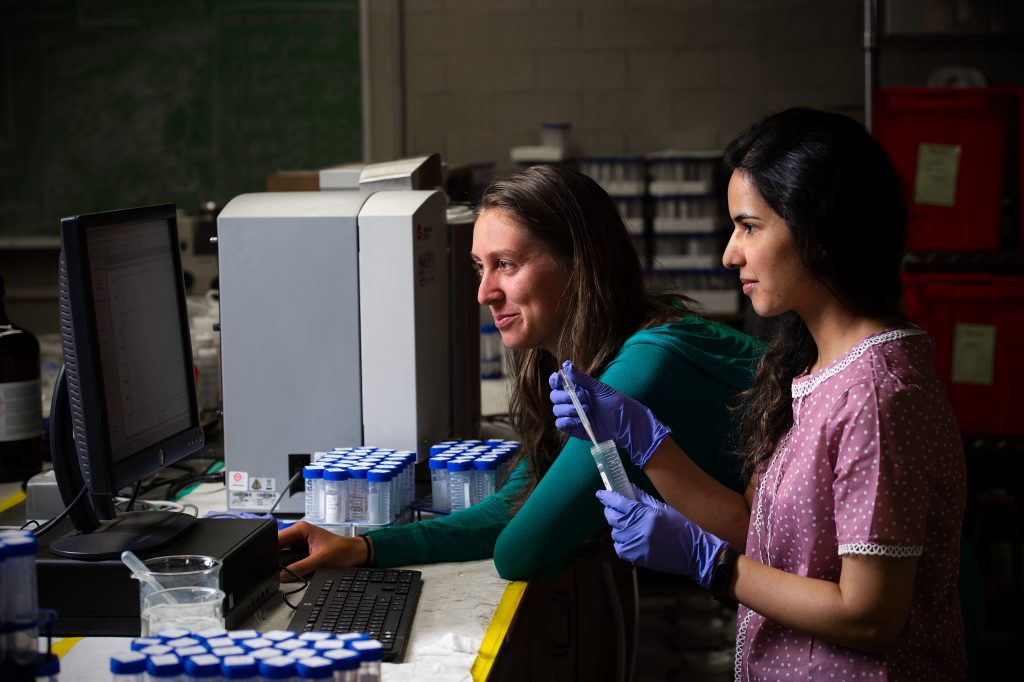 Naomi Weinberg and Aisha Amanullah review sediment data.