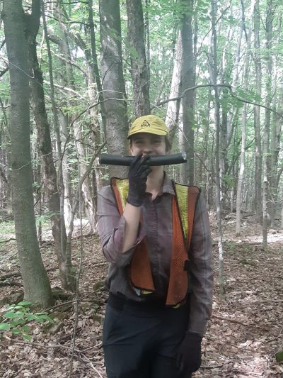 Lenore Fahrig's student Lindsay Daly surveys mammals. Here she is holding a mouse tracking tube.