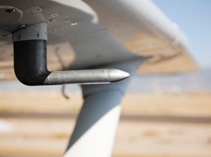 Close-up of a Pitot tube on an airplane.
