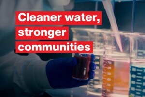 Image with beakers with liquid in them states: Cleaner water, stronger communities