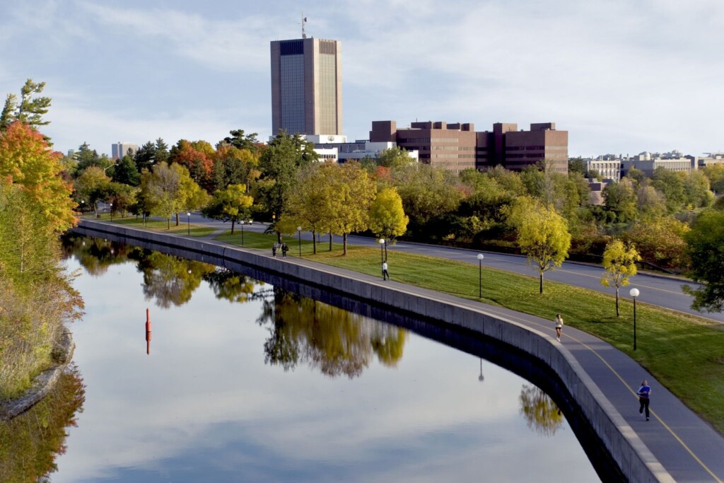 Image of Carleton University campus from the Rideau Canal