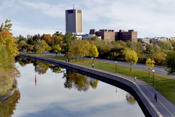 Image of Carleton University campus from the Rideau Canal
