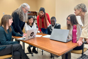 LeFevre and Carleton colleagues Rebecca Merkley (left) and Heather Douglas (right) with several of their students